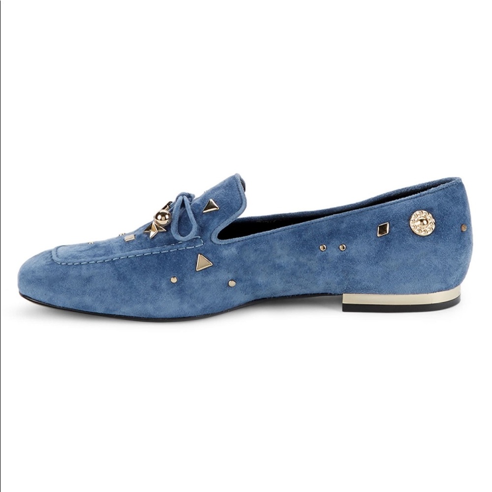 These stylish suede loafers are enlivened with varied studded details